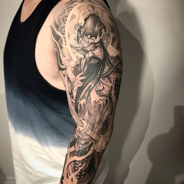 Tattoo Hình xăm quan công ở bắp tay