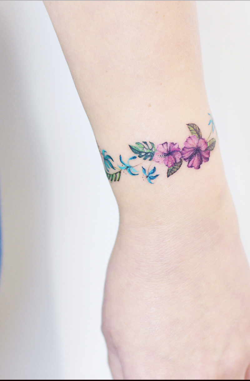 Hình xăm tattoo vòng tay bông hoa